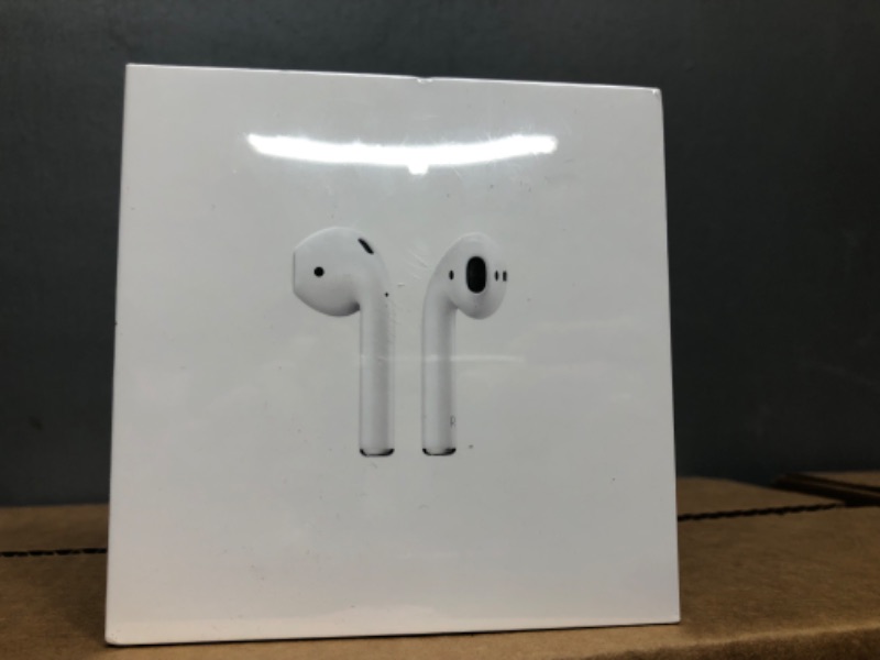 Photo 2 of *BRAND NEW, FACTORY SEALED*
AirPods with Charging Case