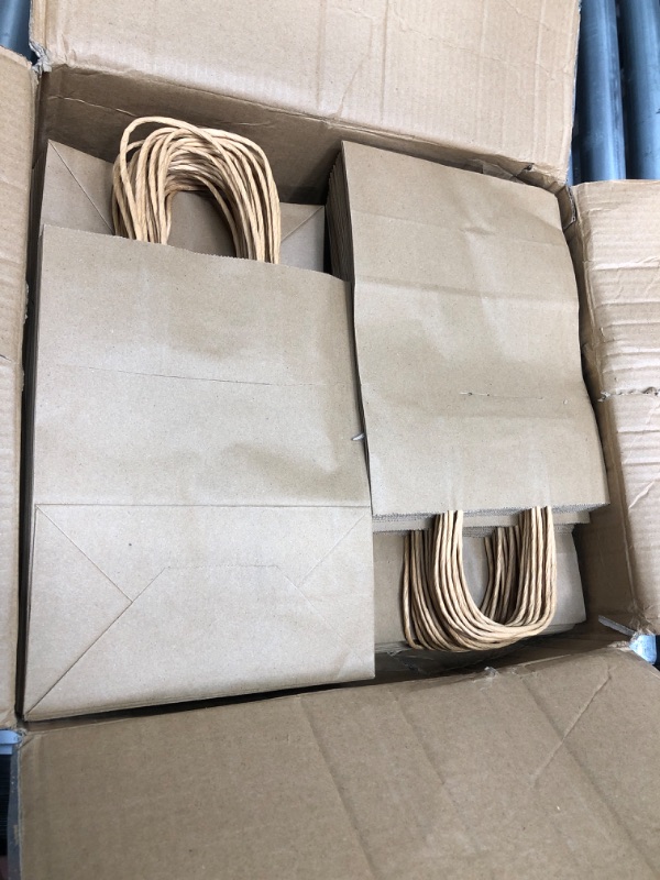 Photo 2 of Amazon Basics Kraft Paper Gift Bags with Handles 8x4.25x10.5 Brown, 100 Pack 100 Count (Pack of 1) 8" x 4.25" x 10.5" Brown