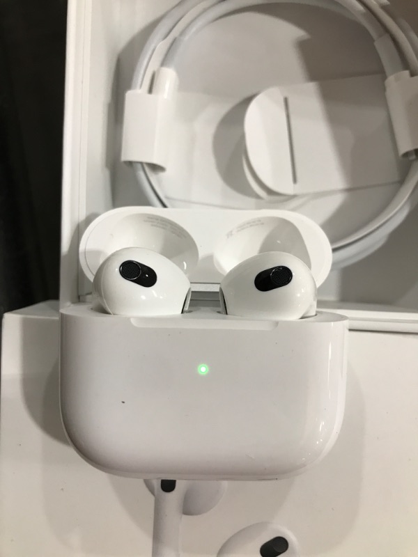 Photo 3 of  Apple AirPods (3rd Generation) Wireless Ear Buds, Bluetooth Headphones, Personalized Spatial Audio, Sweat and Water Resistant, Lightning Charging Case Included, Up to 30 Hours of Battery Life 