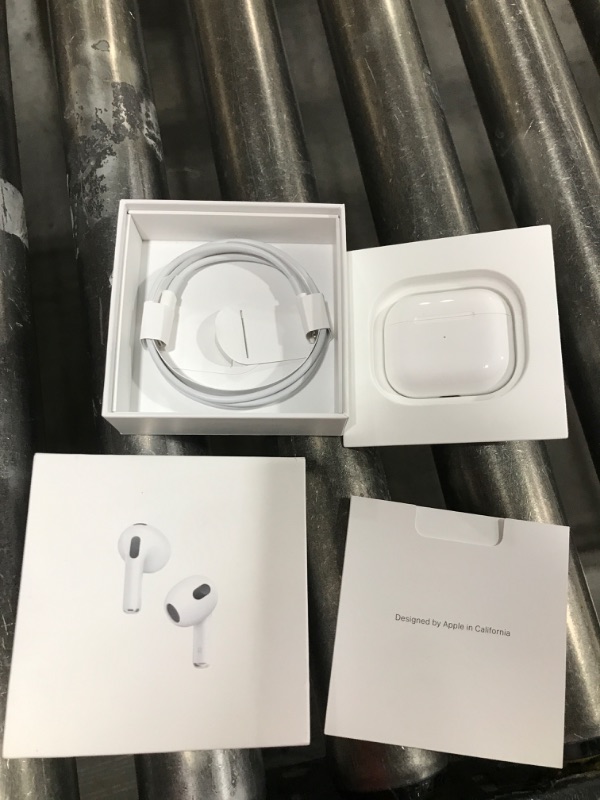 Photo 2 of  Apple AirPods (3rd Generation) Wireless Ear Buds, Bluetooth Headphones, Personalized Spatial Audio, Sweat and Water Resistant, Lightning Charging Case Included, Up to 30 Hours of Battery Life 