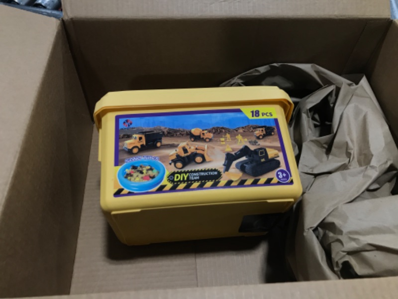 Photo 2 of Play Construction Sand Kit,2.2lbs Magic Sand,8 Alloy Construction Vehicles,1 Inflatable Sandbox,8 Worker Figures and Road Signs,6 Castle Molds,1 Storage Box, Sensory Toys for Kids Ages 3 and up
