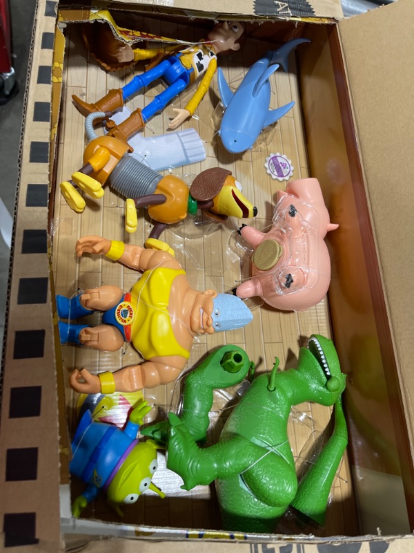 Photo 2 of Disney and Pixar Toy Story Set of 7 Action Figures with Woody, Slinky, Rex, Hamm, Alien, Rocky & Shark, Disney100 Collectible [Amazon Exclusive]