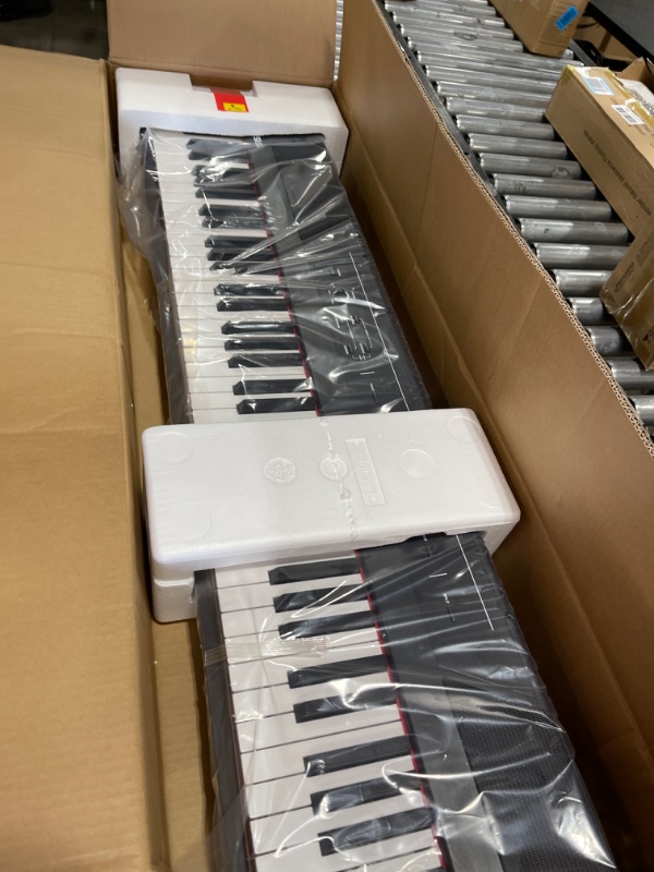 Photo 2 of Alesis Recital – 88 Key Digital Piano Keyboard with Semi Weighted Keys, 2x20W Speakers, 5 Voices, Split, Layer and Lesson Mode, FX and Piano Lessons Recital White Piano Only