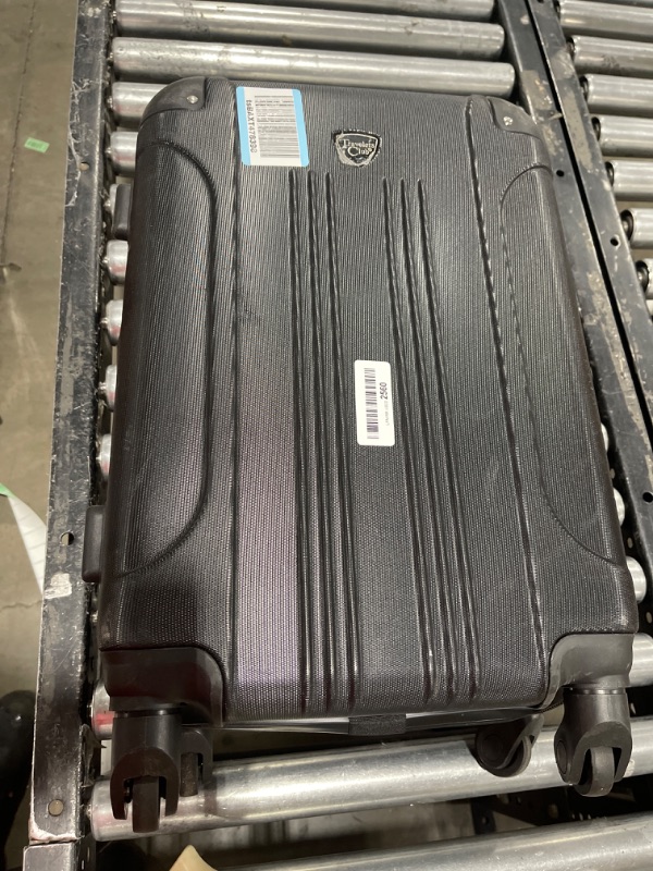 Photo 1 of black suitcase 