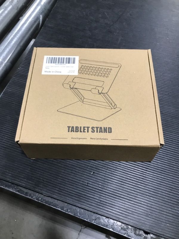 Photo 1 of ALASHI Tablet Stand for Desk, Multi-Angle Adjustable Tablet Holder, Foldable Portable Ergonomic Design, Premium Metal Tablet Riser Compatible with 7 to 13.3 Inches Tablets, Silver
