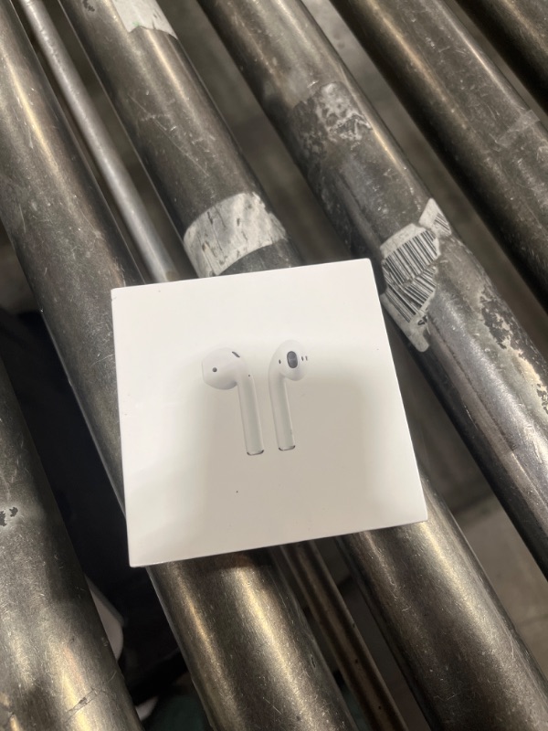 Photo 2 of Apple AirPods with Charging Case (Latest Model)