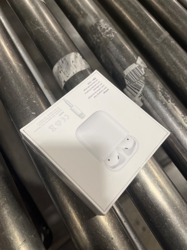 Photo 4 of Apple AirPods with Charging Case (Latest Model)