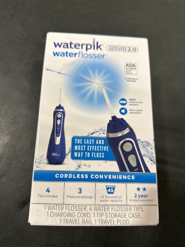 Photo 2 of Waterpik Cordless Advanced Water Flosser For Teeth, Gums, Braces, Dental Care With Travel Bag and 4 Tips, ADA Accepted, Rechargeable, Portable, and Waterproof, Blue WP-583 Blue Water Flosser