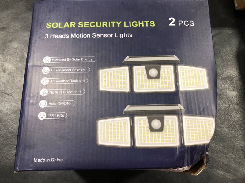 Photo 1 of Tuffenough Solar Outdoor Lights 2500LM 210 LED Security Lights with Remote Control,3 Heads Motion Sensor Lights, IP65 Waterproof,270° Wide Angle Flood Wall Lights with 3 Modes(2 Packs)