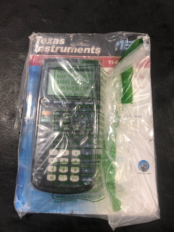 Photo 1 of Texas Instruments TI-83 Plus Graphing Calculator