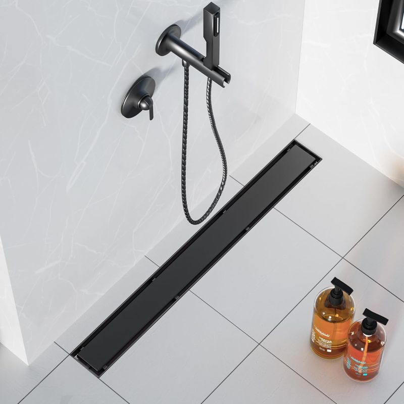 Photo 1 of Neodrain 24-Inch Linear Shower Drain,with 2-in-1 Flat & Tile Insert Shiny Black Cover, Rectangle Shower Floor Drain, Floor Shower Drain with Adjustable Leveling Feet, Hair Strainer
