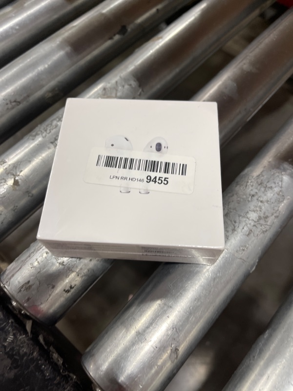 Photo 2 of Apple AirPods with Charging Case (Latest Model)