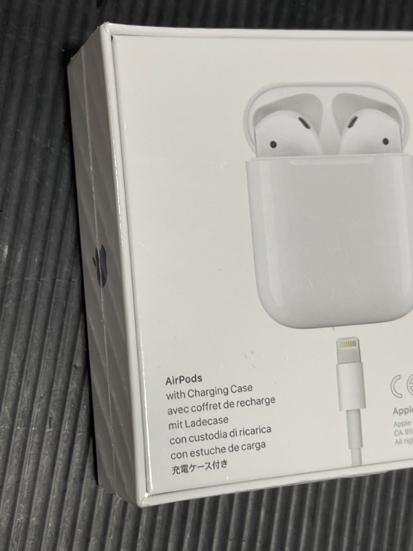 Photo 3 of Apple AirPods with Charging Case (Latest Model)