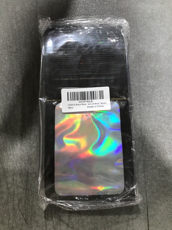 Photo 1 of 100 Pieces Smell Proof Mylar Bags, Holographic Packaging Bags, Resealable Odor Foil Pouch Zipper Bags with Clear Window for Food Storage and Lipgloss, Jewelry Lash (Black, 4 x 6 Inch)
