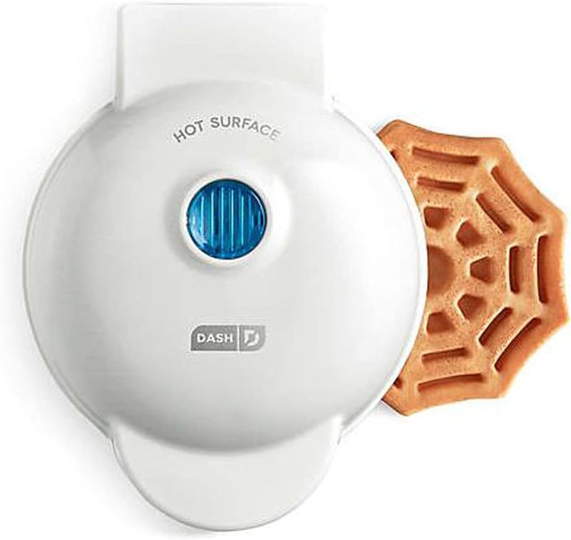 Photo 1 of Dash Spiderweb Mini Waffle Maker Halloween Produces Waffles! Easy to Clean & Non-Stick Surfaces! Make Your Own Tasty Homemade Halloween Treats! white, 6.4inches L x 5inches W x 2.8inches H
