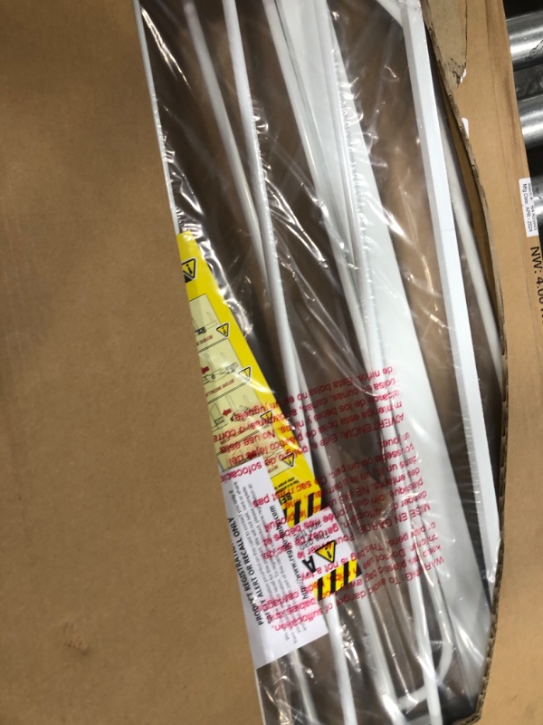 Photo 1 of Regalo Easy Step® 38.5-Inch Extra Wide Walk Thru Baby Gate, Includes 6-Inch Extension Kit, 4 Pack Pressure Mount Kit, 4 Pack Wall Cups and Mounting K
