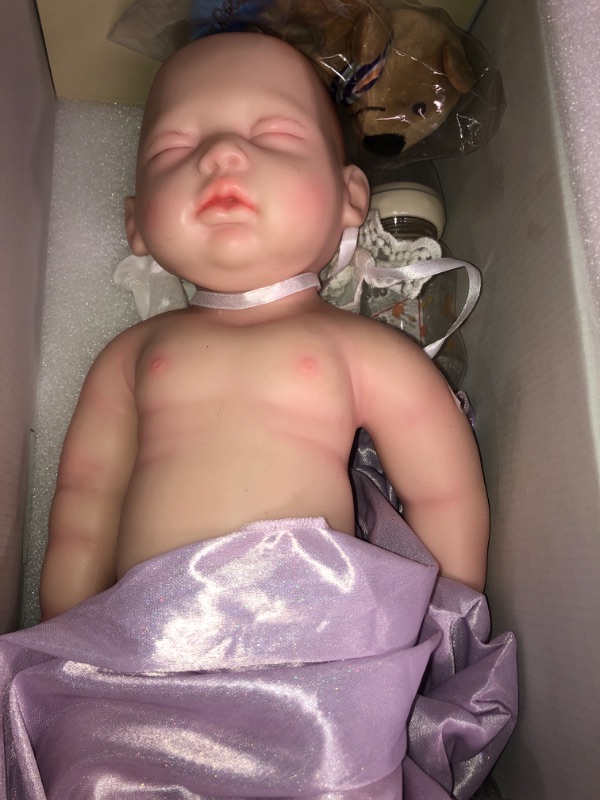 Photo 2 of BABESIDE Reborn Baby Dolls Silicone Full Body Saskia, 12 inch Eye Open Reborn Baby Dolls, Blue Eyes Silicone Baby Girl Doll with Golden Hair, Realistic Baby Dolls Silicone Full Body