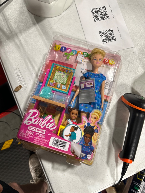 Photo 2 of Barbie Teacher Doll (Blonde),Toddler Doll (Brunette), Flip Board, Laptop, Backpack, Toddler Desk, Pet Turtle, Great Gift for Ages 3 Years Old & Up***damaged box