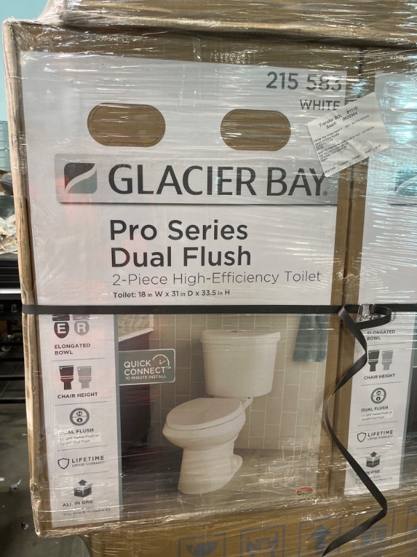 Photo 1 of 2-piece 1.1 GPF/1.6 GPF High Efficiency Dual Flush Complete Elongated Toilet in White, Seat Included