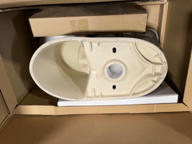 Photo 1 of 2-piece 1.1 GPF/1.6 GPF High Efficiency Dual Flush Complete Elongated Toilet in White, Seat Included