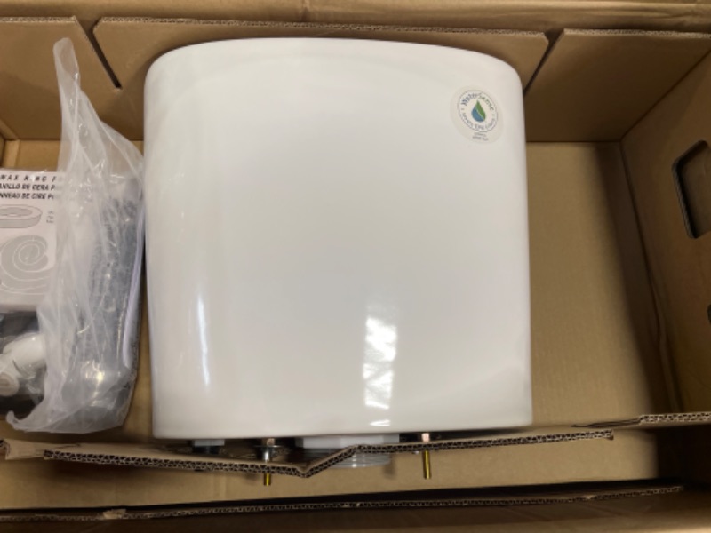 Photo 1 of 2-piece 1.1 GPF/1.6 GPF High Efficiency Dual Flush Complete Elongated Toilet in White, Seat Included