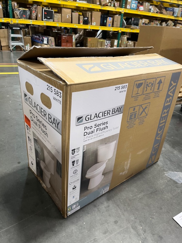 Photo 1 of 2-piece 1.1 GPF/1.6 GPF High Efficiency Dual Flush Complete Elongated Toilet in White, Seat Included