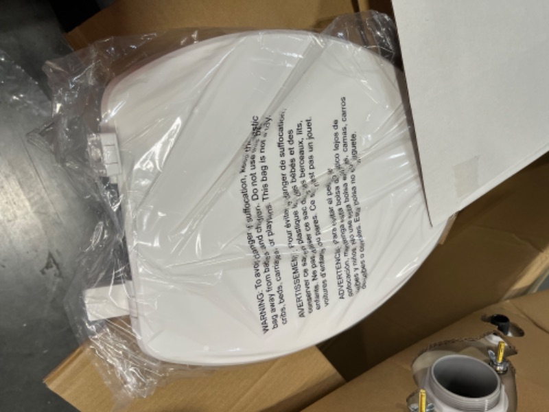 Photo 1 of 2-piece 1.1 GPF/1.6 GPF High Efficiency Dual Flush Complete Elongated Toilet in White, Seat Included