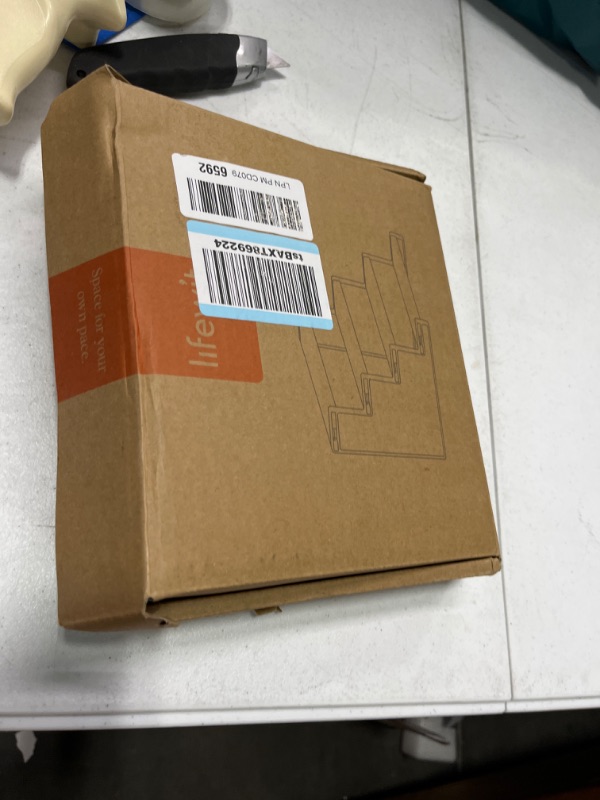 Photo 1 of Lifewit 4 Tier Clear Display Risers Stand, 2 Pack Plastic Risers for Display, Plastic Organizers for Figures, Cupcake, Perfume, Dessert, Desktop Display Stand for Organize and Decoration 9inch,2 pack