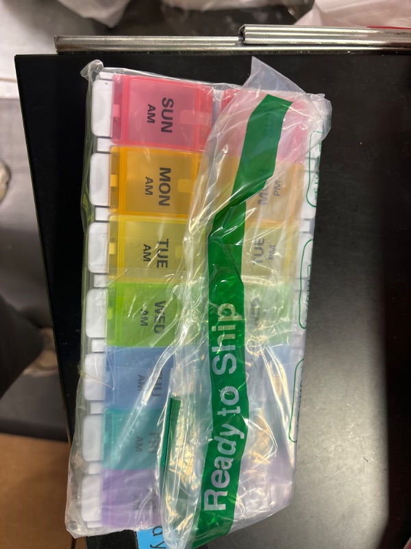 Photo 1 of AM PM Weekly 7 Day Pill Organizer, Sukuos Large Daily Pill Cases Pill Box with Easy Push Button Design for Pills/Vitamin/Fish Oil/Supplements