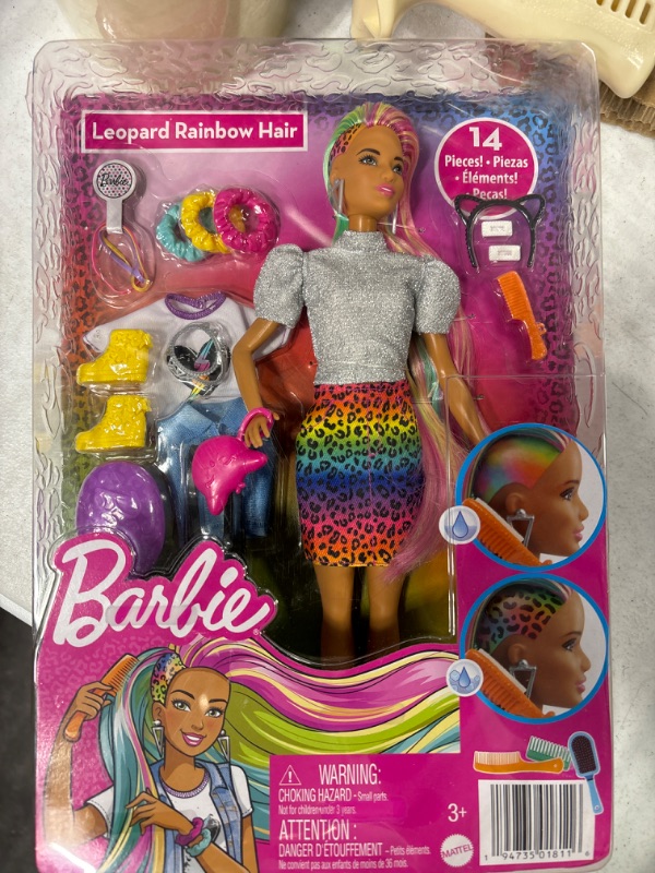 Photo 1 of Barbie Leopard Rainbow Hair Doll (Brunette) with Color-Change Hair Feature, 16 Hair & Fashion Play Accessories Including Scrunchies, Brush, Fashion Tops, Cat Ears, Cat Purse & More