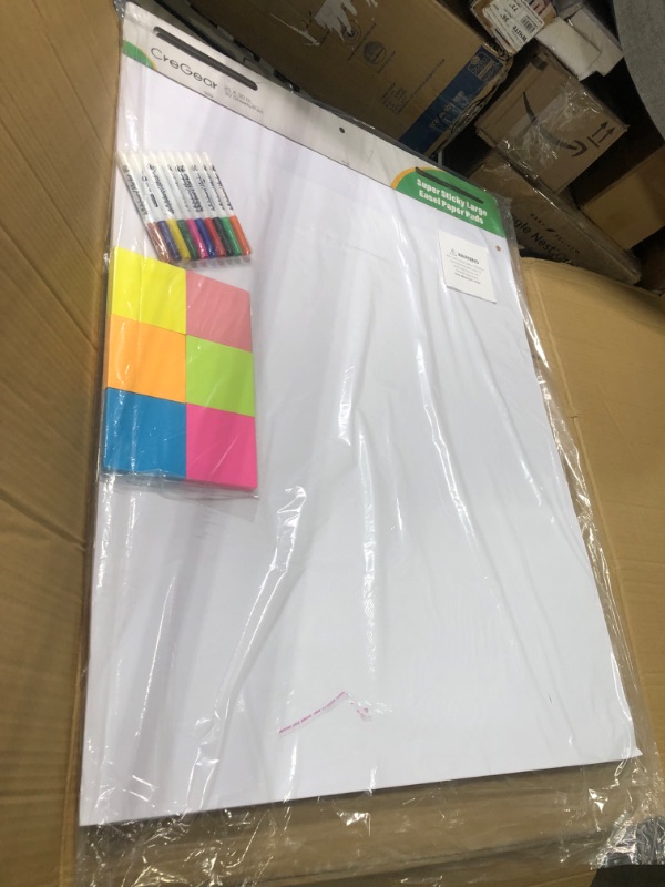 Photo 1 of CREGEAR Easel Paper Pad, Sticky Flip Chart Paper 25 x 30 Inches, Large Easel Papers for Teachers, 30 Sheets/Pad, Easel Paper Pad for White Board with 10 Colorful Markers 6 Sticky Note Pads 3 PACK (25 x 30 Inches 3PACK)