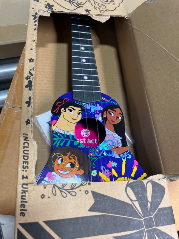 Photo 2 of **STRINGS DAMAGED*** First Act Discovery Encanto Ukulele - 20-Inch Soprano Uke - Ukulele for Beginners - Musical Instruments for Toddlers and Preschoolers - Ready to Play - Make Learning to Play Music Easy and Fun