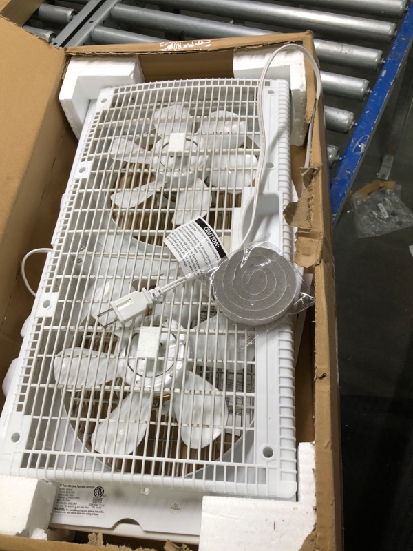 Photo 2 of **Used**Shinic 9-Inch Twin Window Fan with Remote, 3-Speed Reversible Quiet Air Flow and Thermostat Control, Temp Display, 23.8"-37" Expandable Window Exhaust Fan for Smokers, ETL Listed Household Window Fans