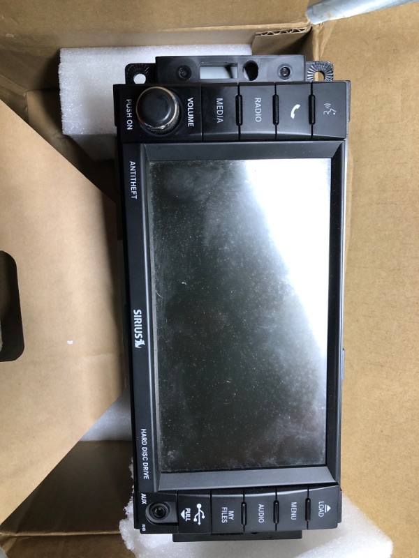 Photo 2 of **New Open**AM/FM XM CD DVD Player Compatible with 2010-2014 Chrysler Dodge Jeep P05091168AD