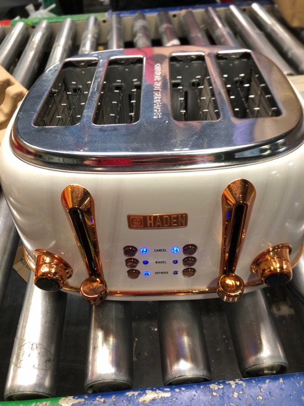 Photo 3 of ***NON FUNCTIONAL//SOLD AS PARTS*** 
Haden 75090 Heritage 4 Slice Toaster, Wide Slot with Removable Crumb Tray and Settings, Ivory/Copper