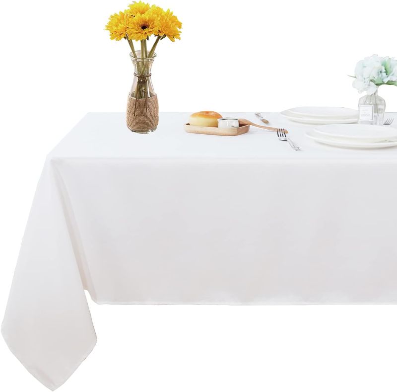 Photo 1 of Fitable Rectangle 4 Feet Tablecloth 60x84 inch Tablecloth Stain and Wrinkle Resistant Washable Polyester Table Cloth, Decorative Table Cover for Dining Table, Buffet Parties and Camping White
