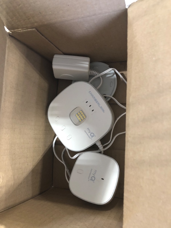 Photo 1 of **USED** myQ Chamberlain Smart Garage Control - Wireless Garage Hub and Sensor with Wifi & Bluetooth - Smartphone Controlled, myQ-G0401-ES, White myQ Smart Garage™ Control