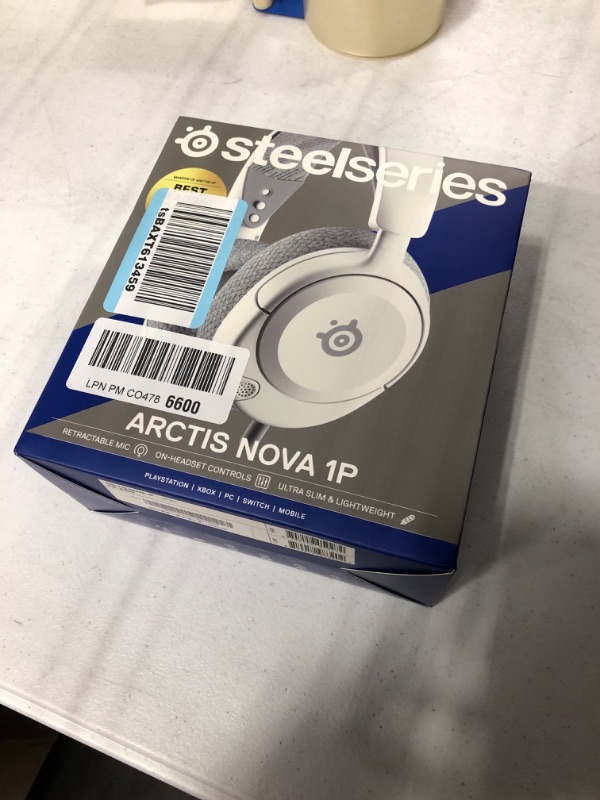 Photo 2 of **new open box **
SteelSeries Arctis Nova 1P Multi-System Gaming Headset — Hi-Fi Drivers — 360° Spatial Audio — Comfort Design — Durable — Lightweight — Noise-Cancelling Mic — PS5/PS4, PC, Xbox, Switch - White Nova 1P White
