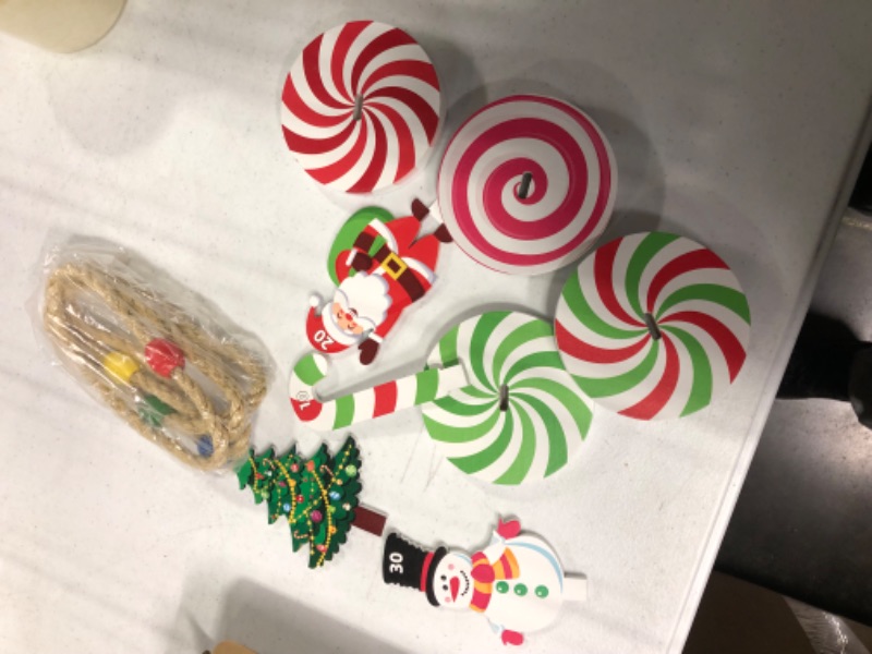 Photo 1 of Christmas Wooden Ring Toss Game Set, Christmas Ring Toss with 4 Rings Candy Cane Snowman Christmas Tree Santa Claus Nutcracker Fun Games for Kids Christmas Classroom Party Family Games Cute Style
