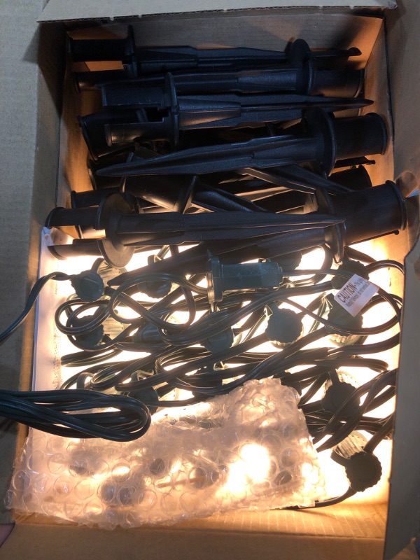 Photo 3 of **USED** PerPaiMe C9 Christmas Pathway Lights Outdoor LED - 24.2 Feet String Lights with 20 Bulbs, Waterproof Christmas Path Lights with Stake for Yard, Garden, Lawn, Walkway, Driveway, Sidewalk, Warm White Warm White 24.2 Feet