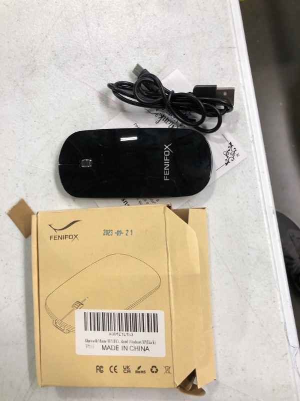 Photo 2 of Bluetooth Mouse FENIFOX Slim Mini Whisper-Quiet Flat Portable Wireless Mice Rechargeable Compatible with Laptop,PC,Tablet Android Windows XP(Black)