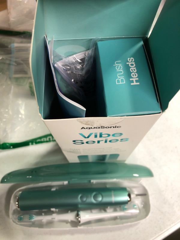 Photo 2 of Aquasonic Vibe Series Ultra-Whitening Toothbrush – ADA Accepted Power Toothbrush - 8 Brush Heads & Travel Case – 40,000 VPM Motor & Wireless Charging - 4 Modes w Smart Timer – Mint Green Metallic