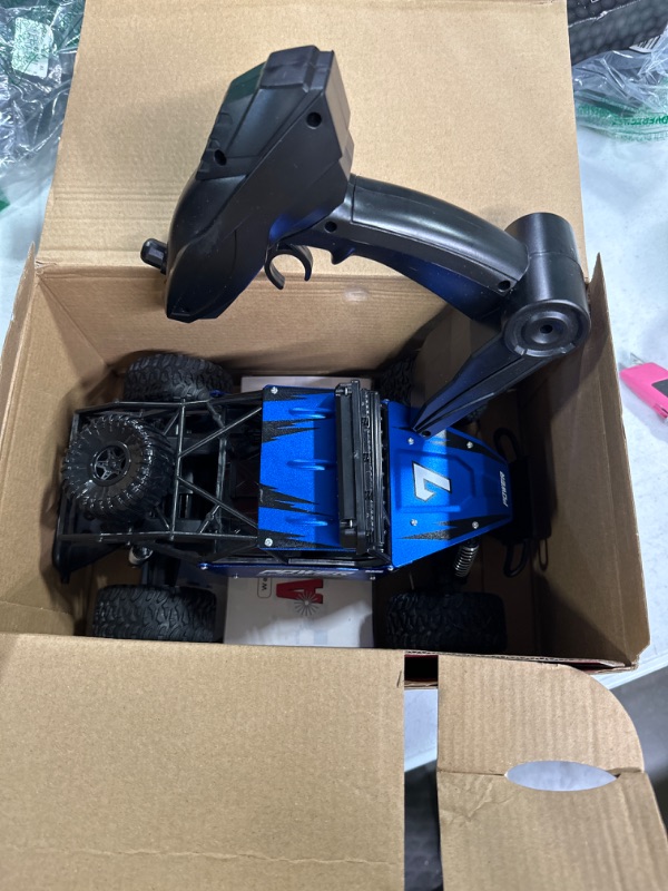 Photo 2 of **SOLD AS PARTS* BEZGAR TB141 RC Cars-1:14 Scale Remote Control Car, 2WD High Speed 20 Km/h All Terrains Electric Toy Off Road RC Car Vehicle Truck Crawler with Two Rechargeable Batteries for Boys Kids and Adults Blue 1:14 Scale