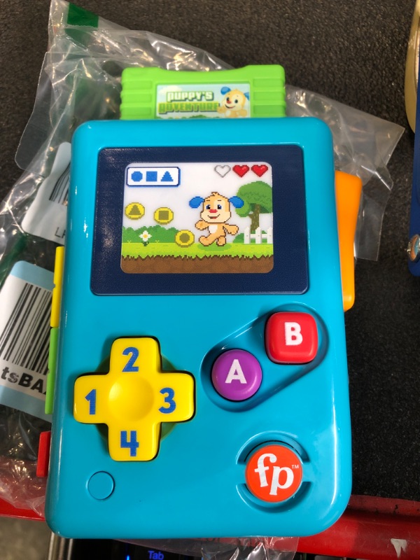 Photo 3 of Fisher-Price Learning Toy Bundle with Laugh & Learn Click & Learn Laptop Pretend Computer and Lil’ Gamer Musical Toy Lil' Gamer + Laptop