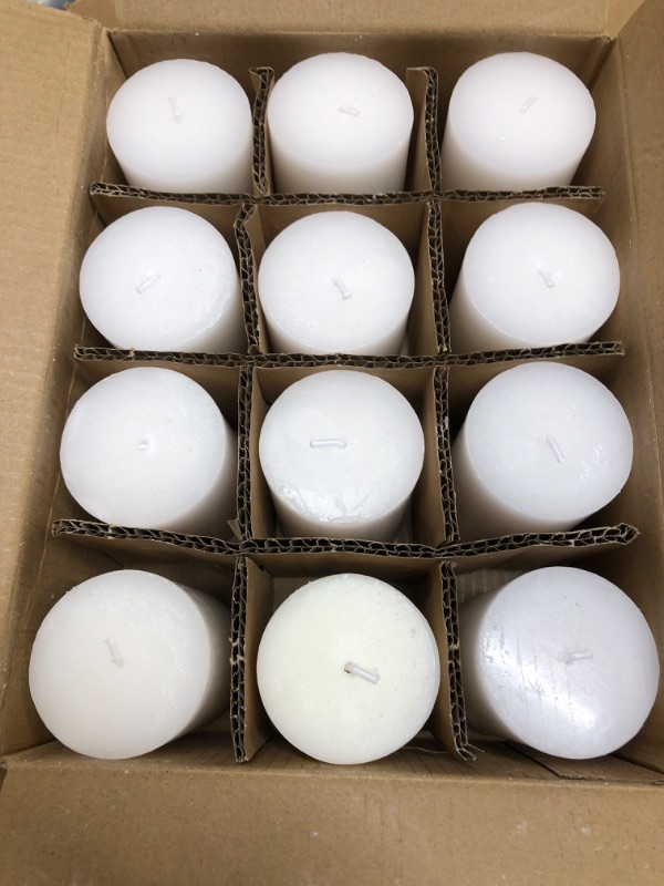 Photo 3 of **USED** 12 Pcs White Pillar Candles, 2.8x4 Inches 50 Hour Long Lasting Candles, Smokeless & Dripless