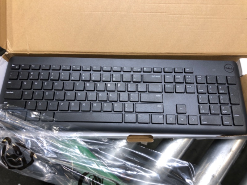 Photo 1 of Dell Wireless Keyboard and Mouse - KM3322W, Wireless - 2.4GHz, Optical LED Sensor, Mechanical Scroll, Anti-Fade Plunger Keys, 6 Multimedia Keys, Tilt Leg - Black