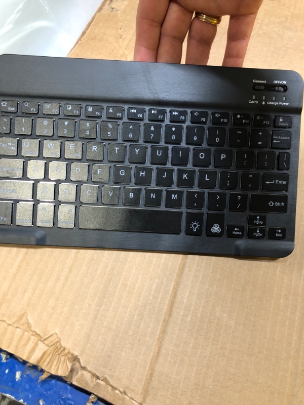 Photo 1 of Backlit Bluetooth Keyboard Small Portable External Wireless Keyboard Cordless Rechargeable Illuminated for Android Tablet Cell Phone Smartphone iPad Pro Air Mini iPhone Windows Surface (Black)