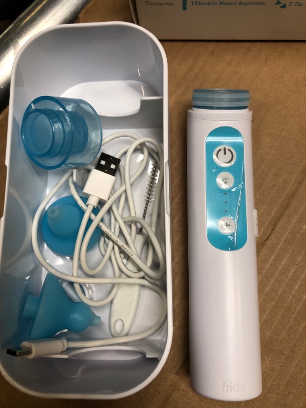 Photo 1 of FridaBaby Electric NoseFrida | USB Rechargeable Nasal Aspirator with Different Levels of Suction by Frida Baby