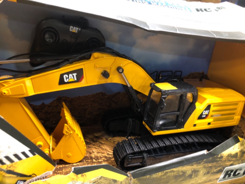 Photo 1 of Diecast Masters RC Truck CAT 336 Excavator | Fully Functional Radio Control Excavator Truck | 1:24 Scale Model Remote Control Truck, RC Caterpillar Trucks | CAT Yellow Diecast Model 25001