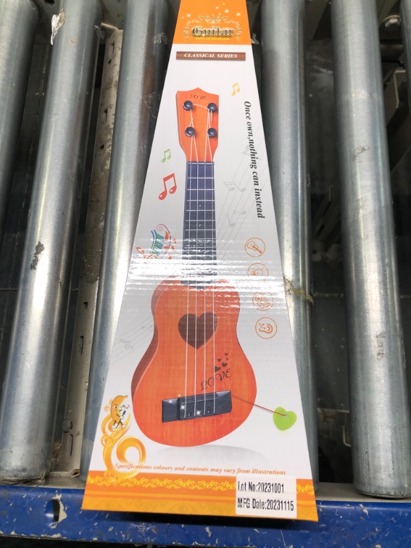 Photo 2 of YEZI Kids Toy Classical Ukulele Guitar Musical Instrument, Brown